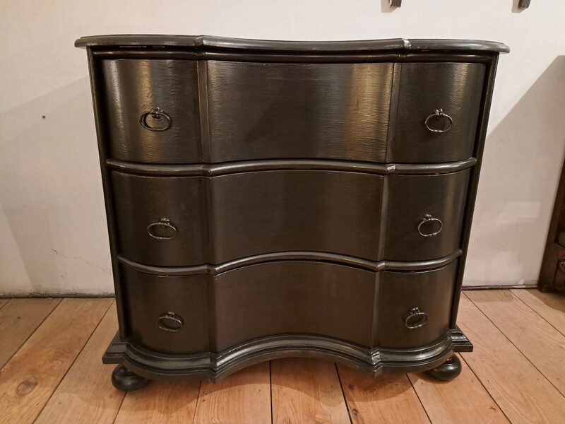 Baroque black lacquered chest of drawers