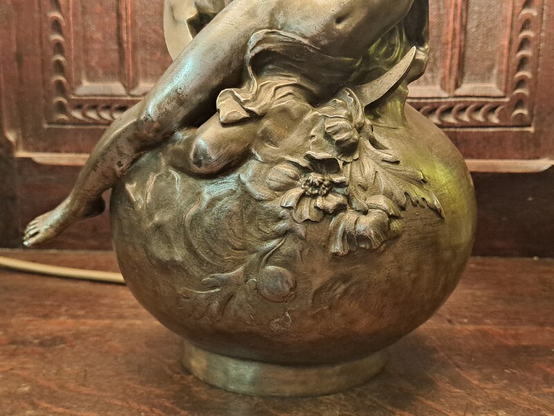 Brushed spelter lamp signed by Louis Moreau