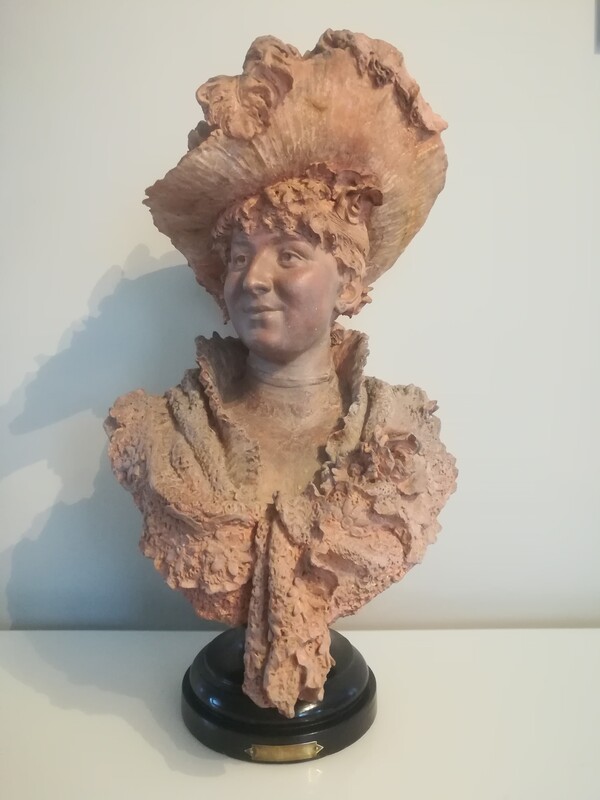 Bust of terracotta woman in hat signed Van Den Bossche