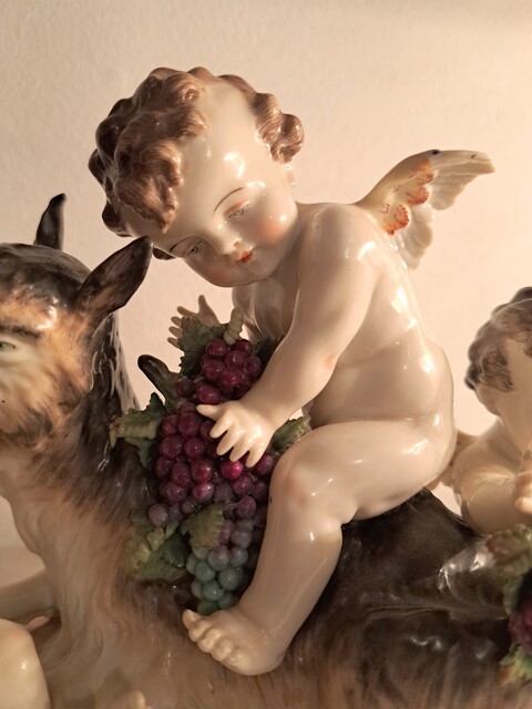 Capodimonte polychrome porcelain group of cherubs and a goat