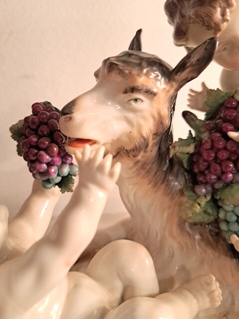 Capodimonte polychrome porcelain group of cherubs and a goat