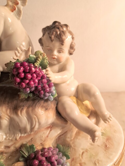 Capodimonte polychrome porcelain group of cherubs and a goat