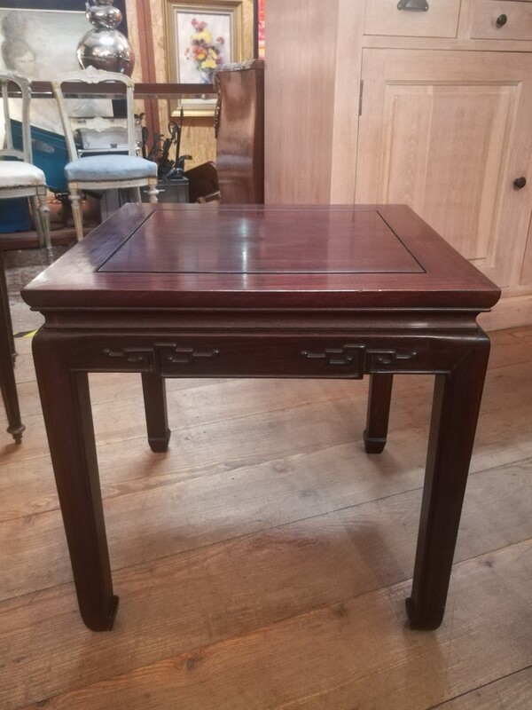 Carved exotic wood side table