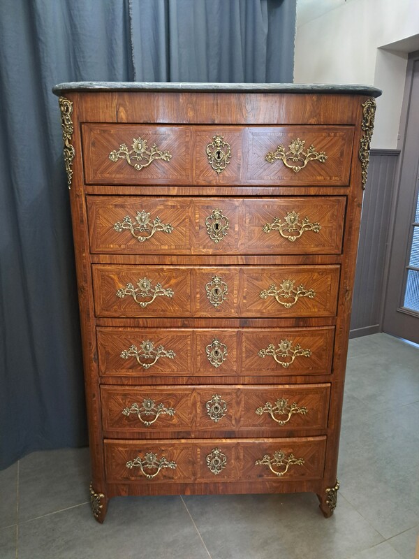 Regency style chest of drawers in rosewood with a marble top