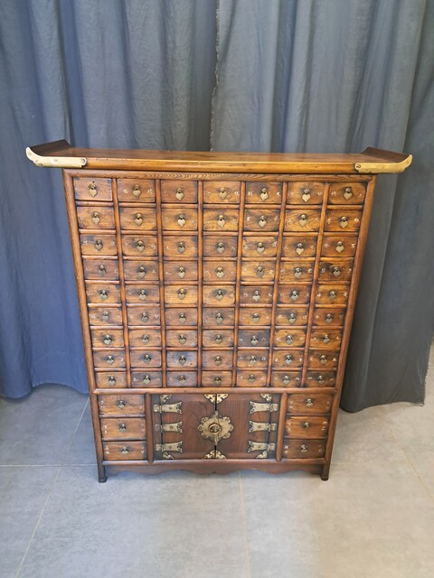 Chinese apothecary cabinet in exotic wood and gilt brass