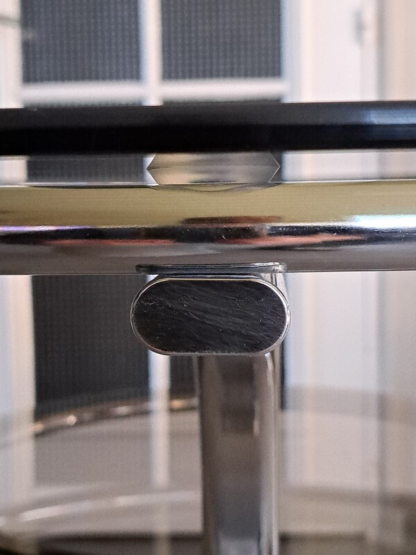 Chromed metal table with 2 smoked glass tops