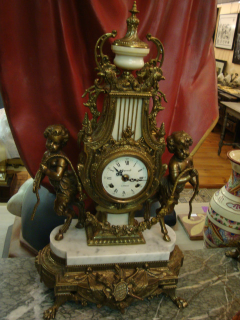 Clock and two marble and control trims 