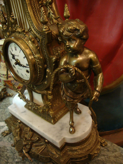 Clock and two marble and control trims 