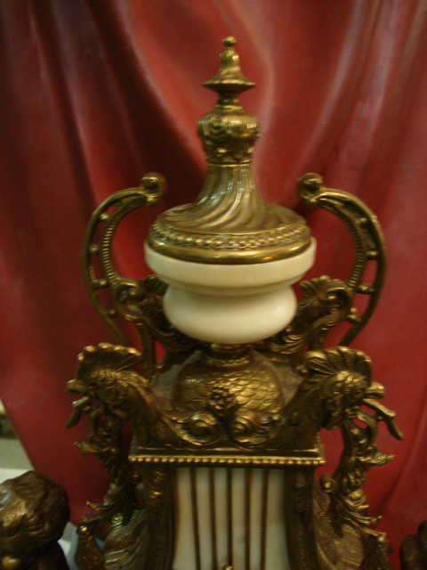 Clock and two marble and control trims 