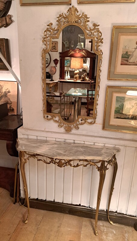 Gilt bronze and marble top console and its mirror
