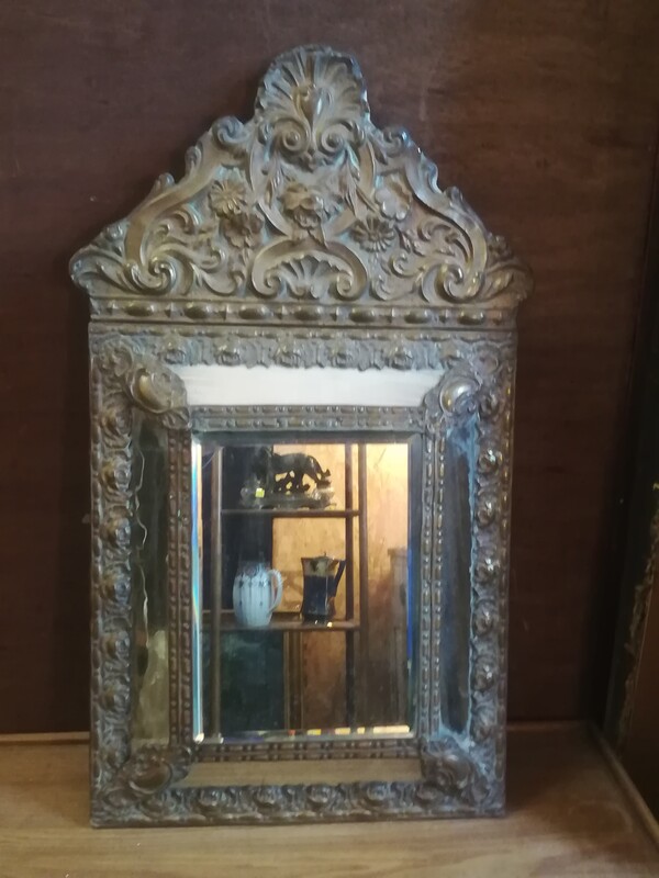 Embossed copper with glazing beads mirror