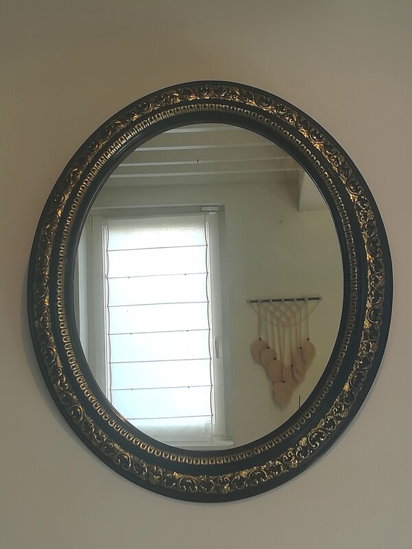 Gilded and black stucco Napoléon III mirror