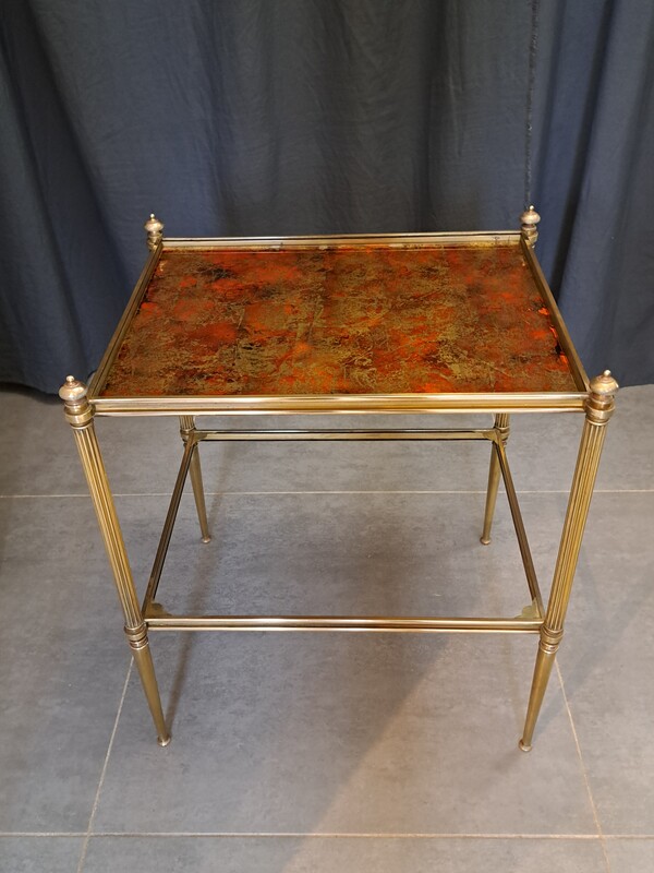 Gilt brass and glass top gold leaves and red maison Jansen side table