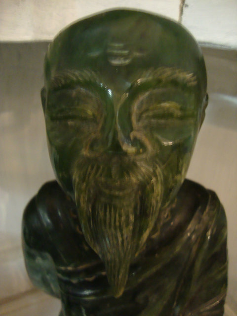 Green stone sculpted chinese wiseman statue