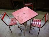 Iron bar table with is 3 chairs