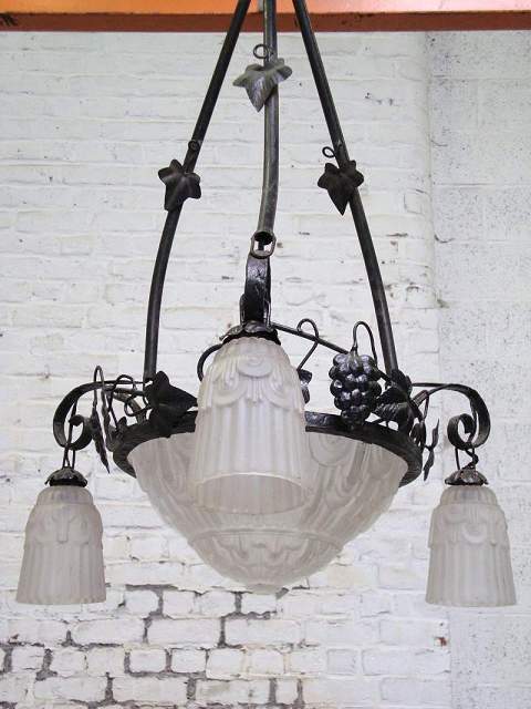 Iron wrought art deco moulded glass chandelier