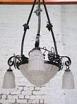 Iron wrought art deco moulded glass chandelier