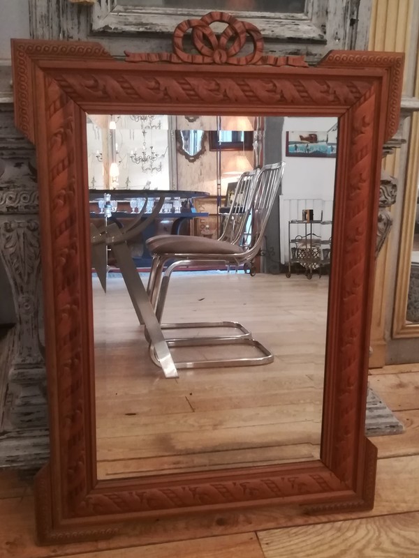 Louis XVI style beveled mirror in carved ash