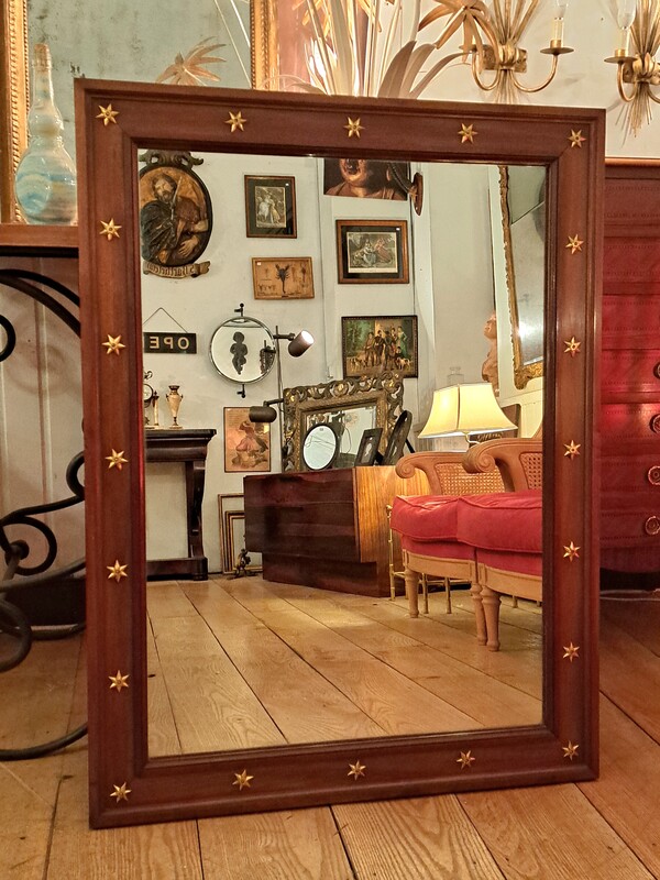 Mahogany and gilt bronze maison Carlhian Empire style mirror