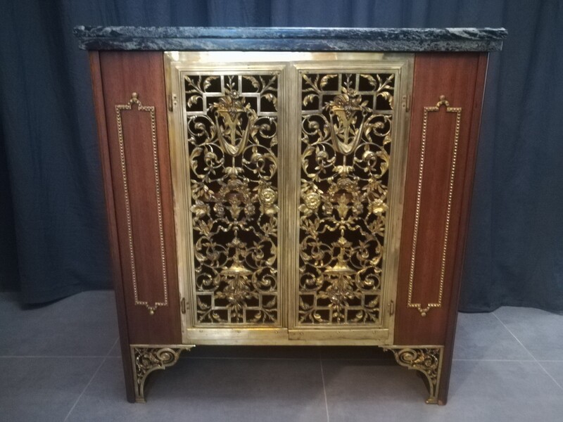 Mahogany veneer, bronze and marble top low dresser