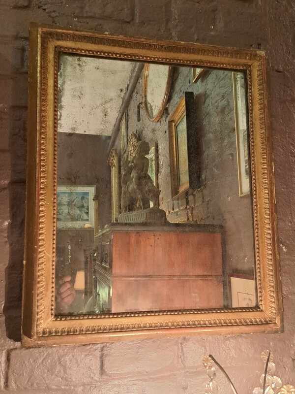 Louis XVI period giltwood mirror