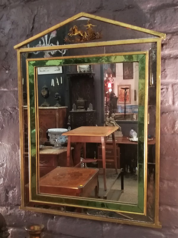 Gilded wood two-tone green and oxidized pareclose mirror