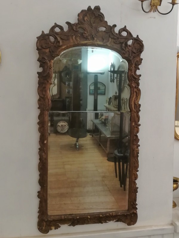 Louis XV style mirror in gilded stucco