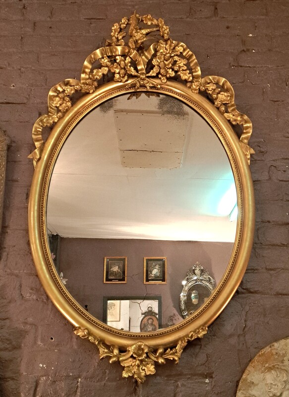 Louis XVI style gilded gold leaf stucco with swallow motif mirror