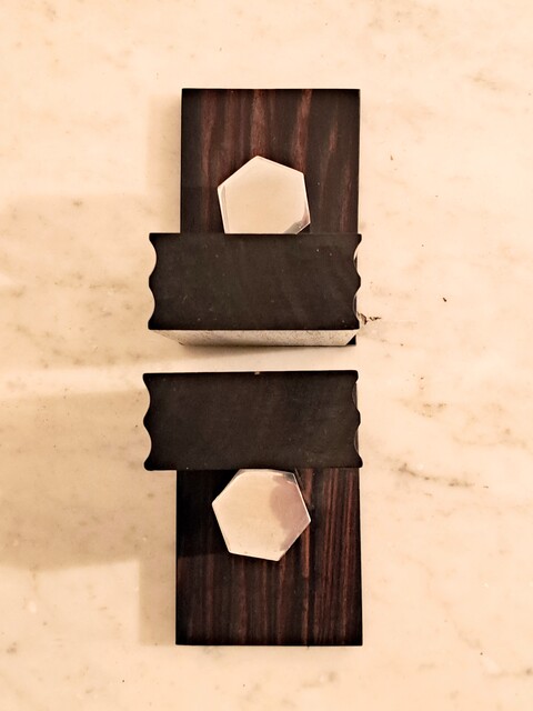 Pair of Art Deco bookends in Macassar ebony and chromed steel