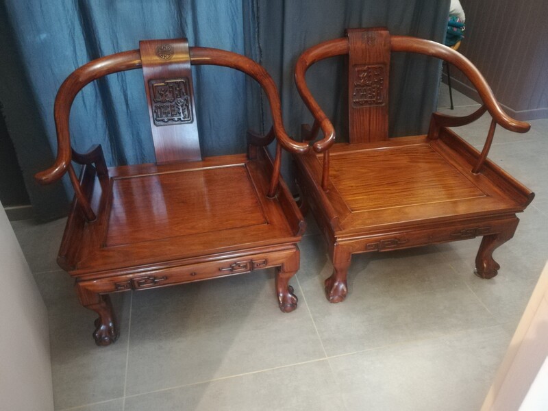 Pair of exotic carved wood chinese armchairs