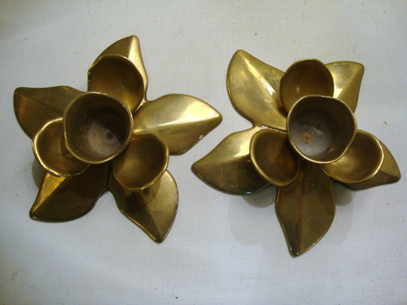 Pair of golden metal flowery candlesticks