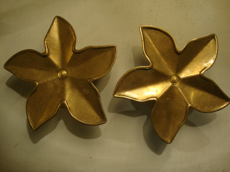 Pair of golden metal flowery candlesticks