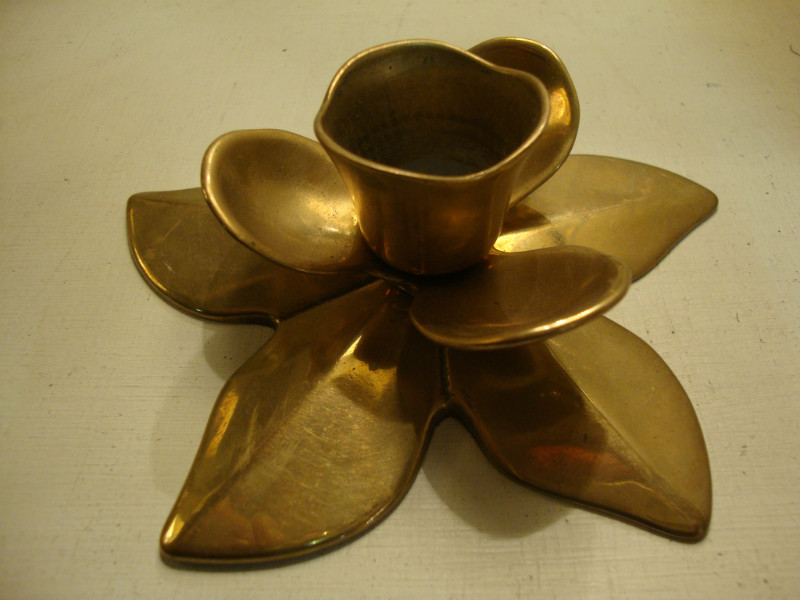 Pair of golden metal flowery candlesticks