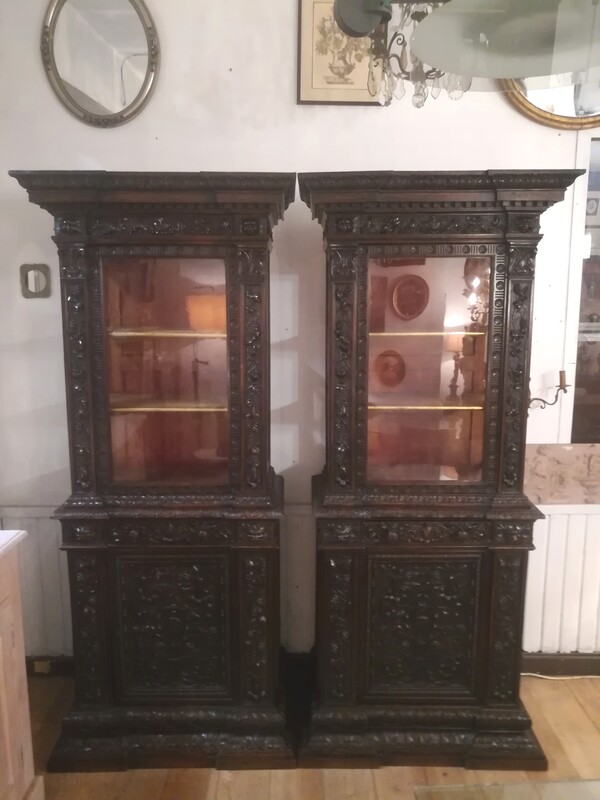 Pair of richely carved dark walnut bookcases
