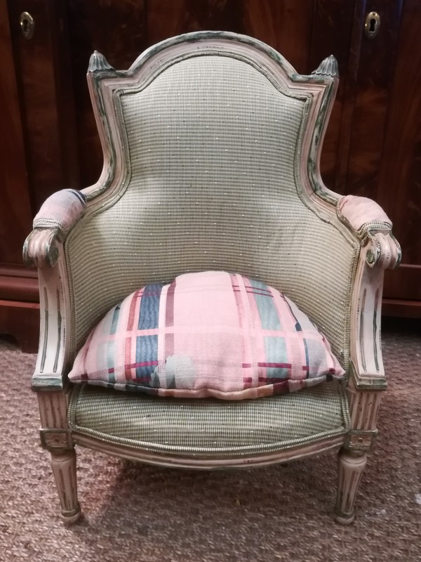 Patinated wood Louis XVI style bergère armchair 