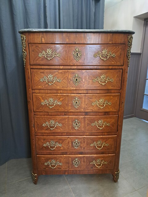 Regency style chest of drawers in rosewood with a marble top
