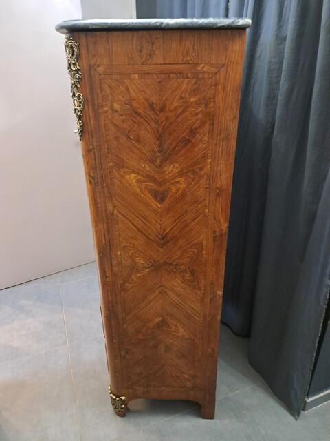 Regency style chest of drawers in rosewood with a marble top