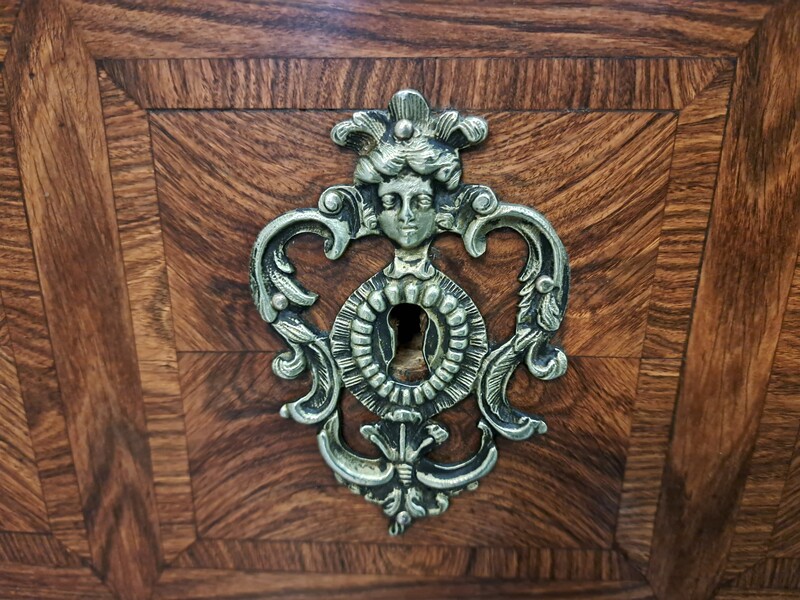 Regency style chest of drawers in rosewood with a marble top