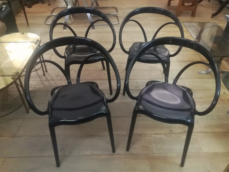 Set of 4 black molded plastic 