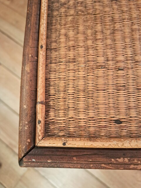 Side table made of bamboo and woven straw