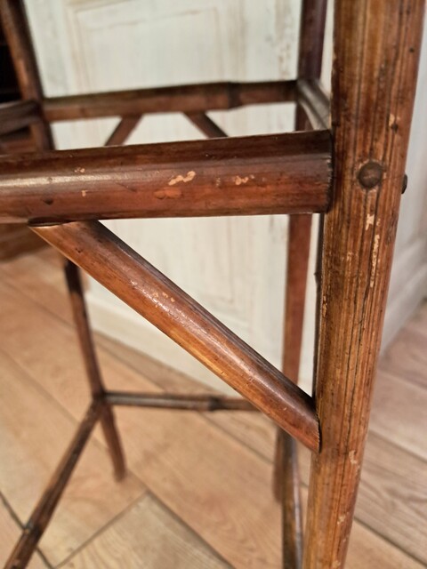 Side table made of bamboo and woven straw