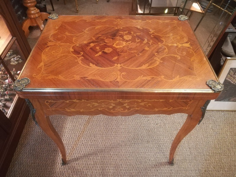Louis XV style game table with marquetry