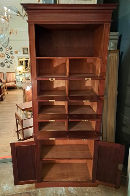  Two-piece mahogany notary's cabinet with hinged doors