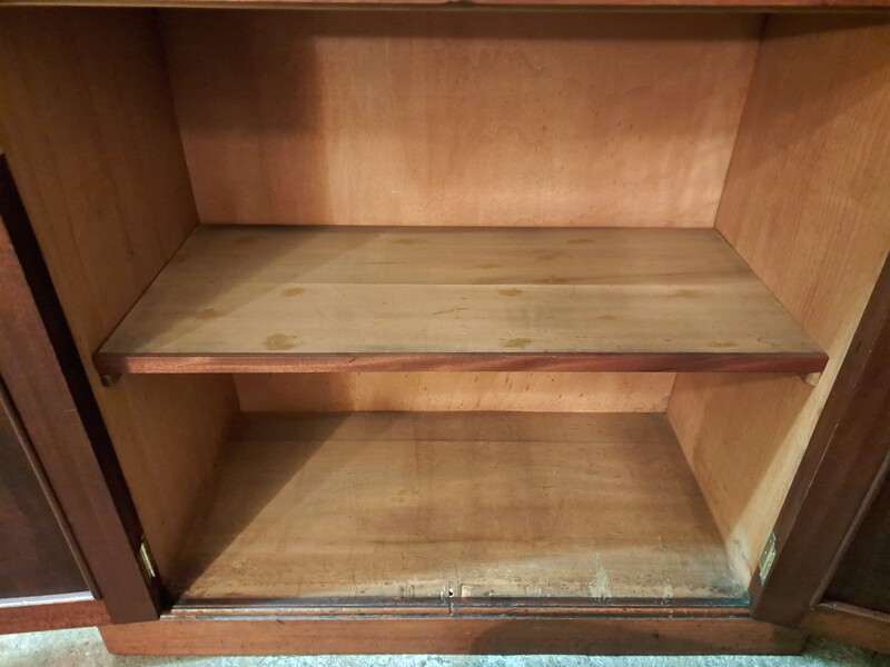  Two-piece mahogany notary's cabinet with hinged doors