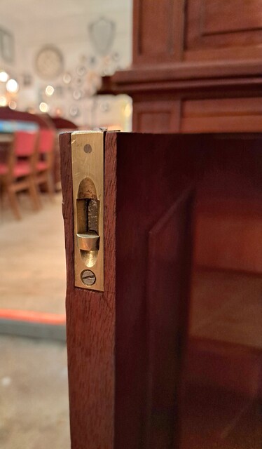  Two-piece mahogany notary's cabinet with hinged doors