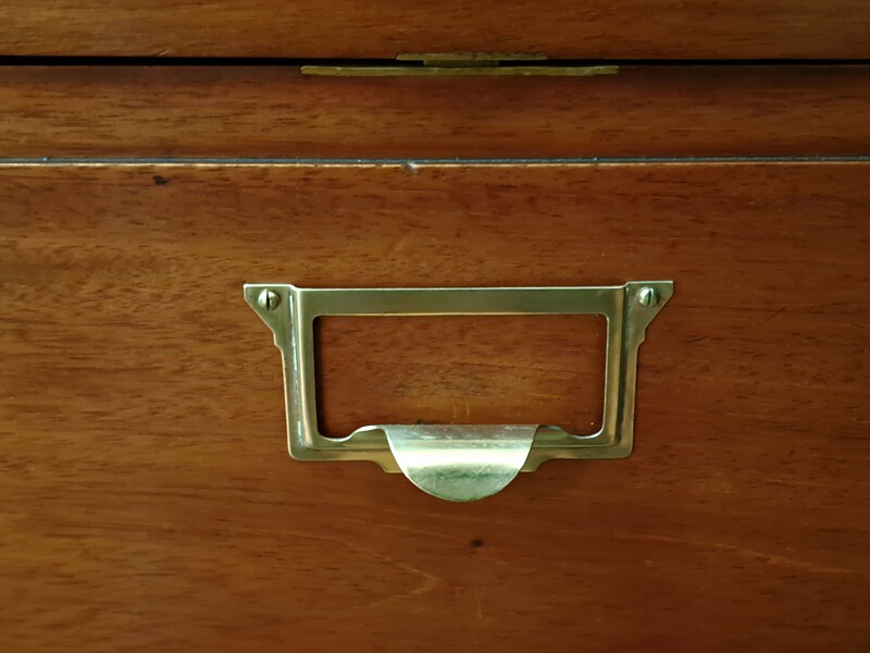  Two-piece mahogany notary's cabinet with hinged doors