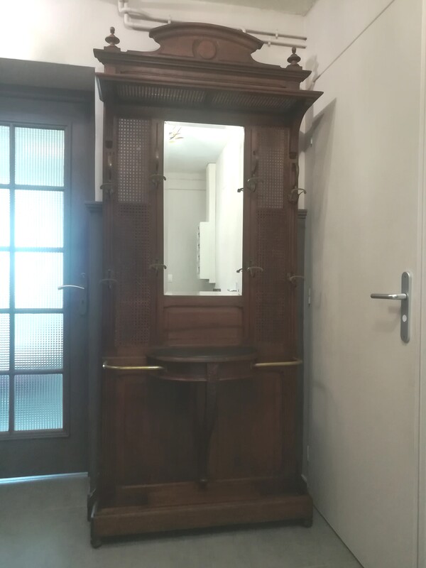 Walnut and canned wall coatstand